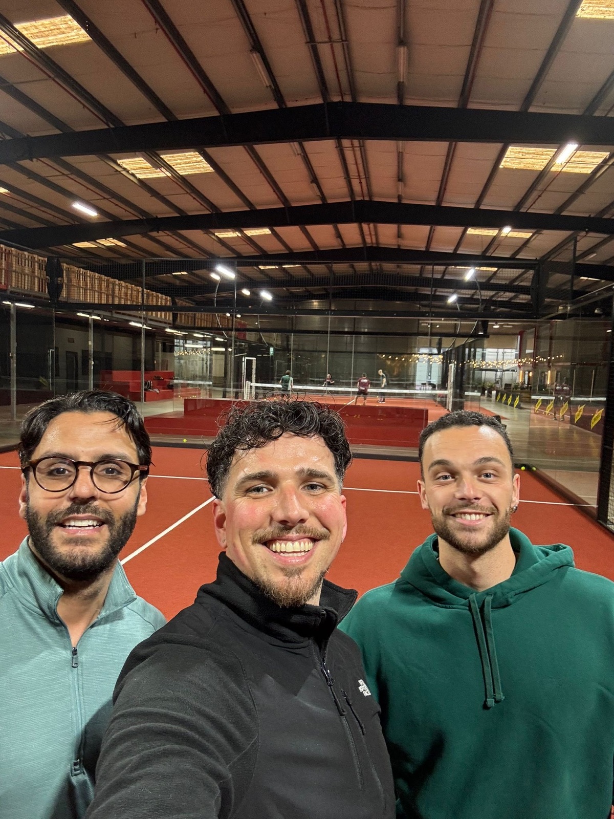 Kevin Padel with fellow coaches on court